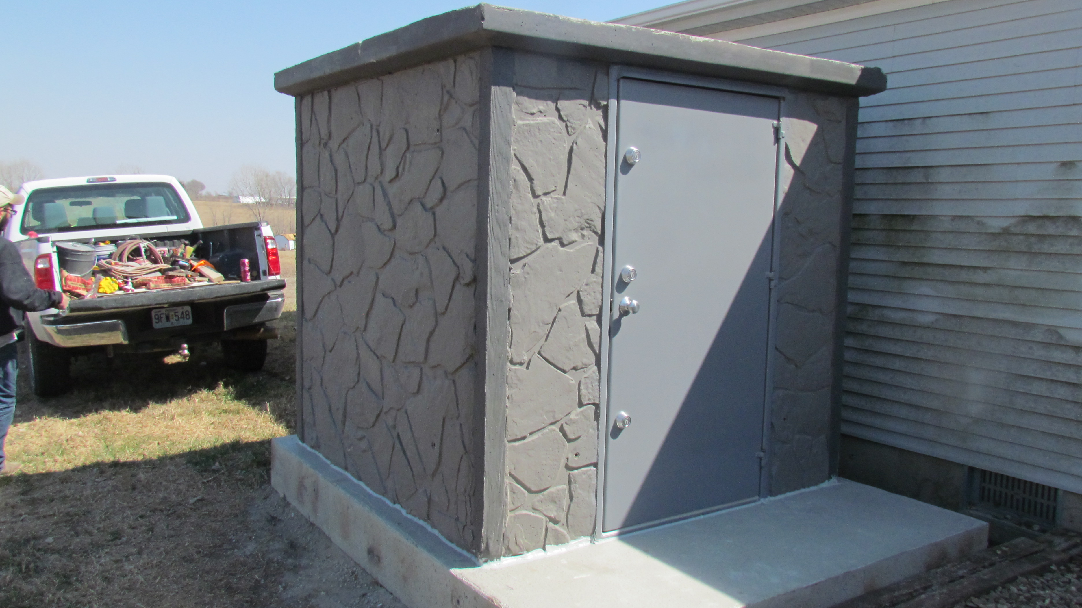 metal storm shelter holding water